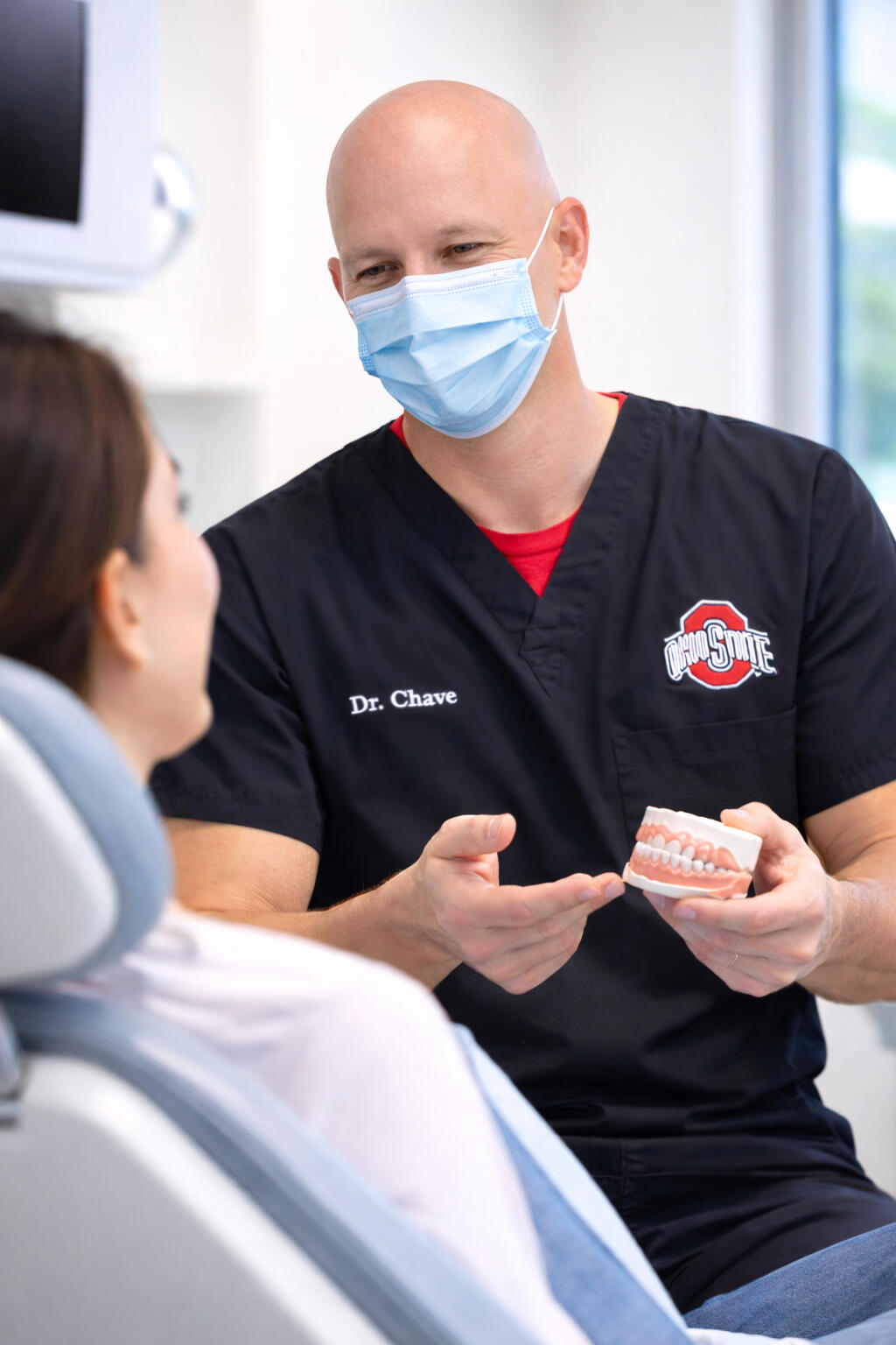 David P. Chave with a patient