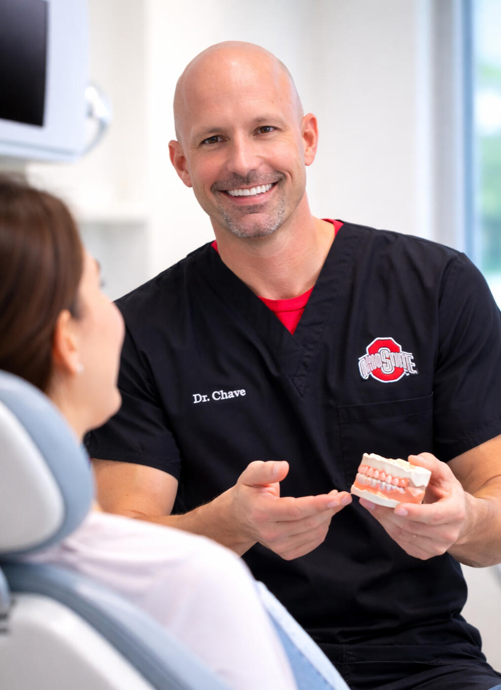 David P. Chave with a patient